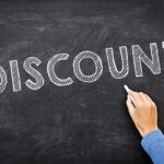 discounts written on blackboard