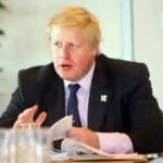 Boris Johnson Hosting a meeting