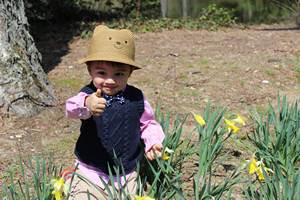 Child with thumb up